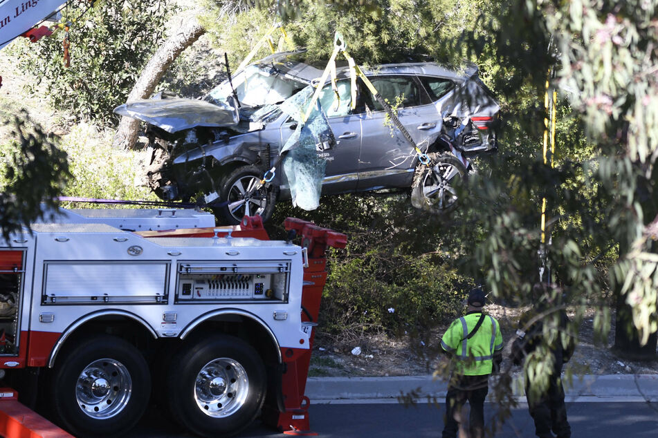 Tiger Woods car is removed from a hillside after his crash in Rancho Palos Verdes, California.