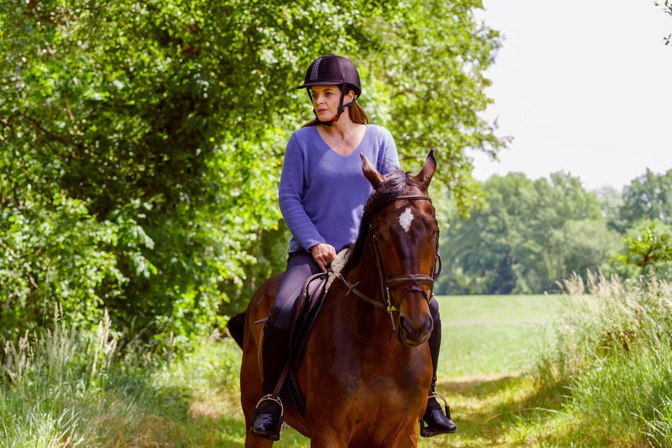 Susanne will beim Reiten den Kopf freibekommen.