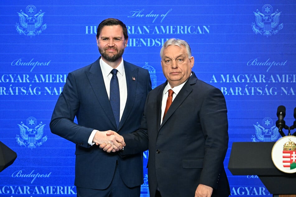 Hungary's Prime Minister Viktor Orban (R) and US Vice President JD Vance (L) shake hands after a joint press conference in Budapest, Hungary on Wednesday.