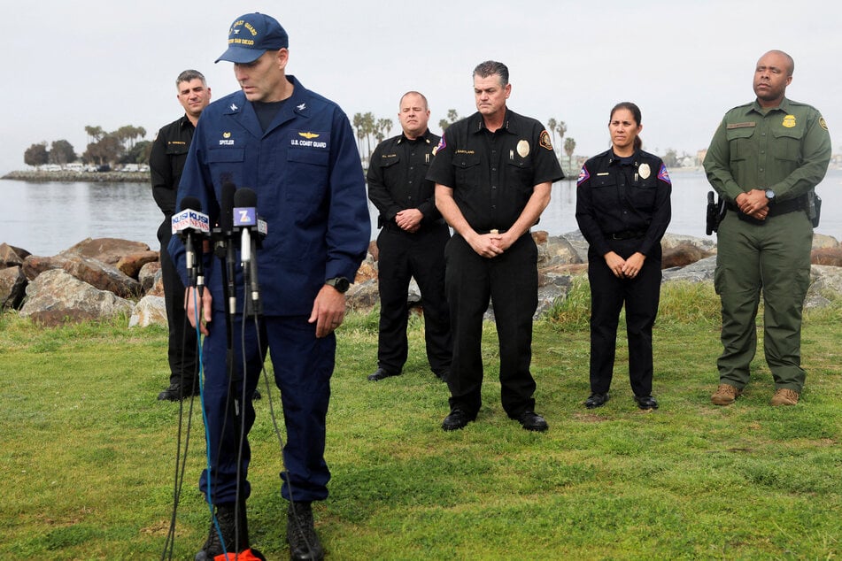 The US Coast Guard gave a press briefing on the scene after search and rescue operations were hampered by conditions.