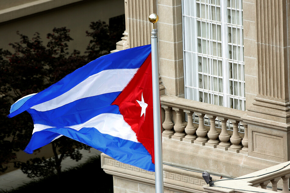 Two suspected Molotov cocktails were thrown at the Cuban embassy building in Washington DC.