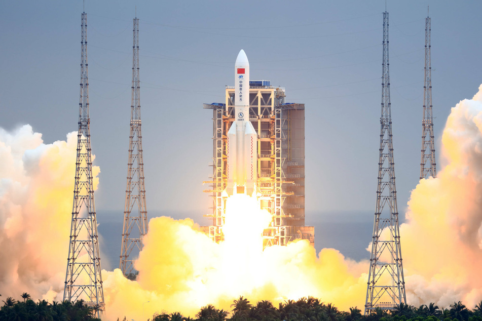 A rocket carrying the Tianhe core module of China's Tiangong Space Station blasts off from the Wenchang Spacecraft Launch Site on April 29, 2021 in Wenchang, Hainan Province of China.