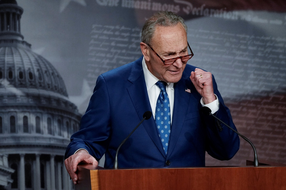 Senate Majority Leader Chuck Schumer speaking to the media after the Inflation Reduction Act passed.