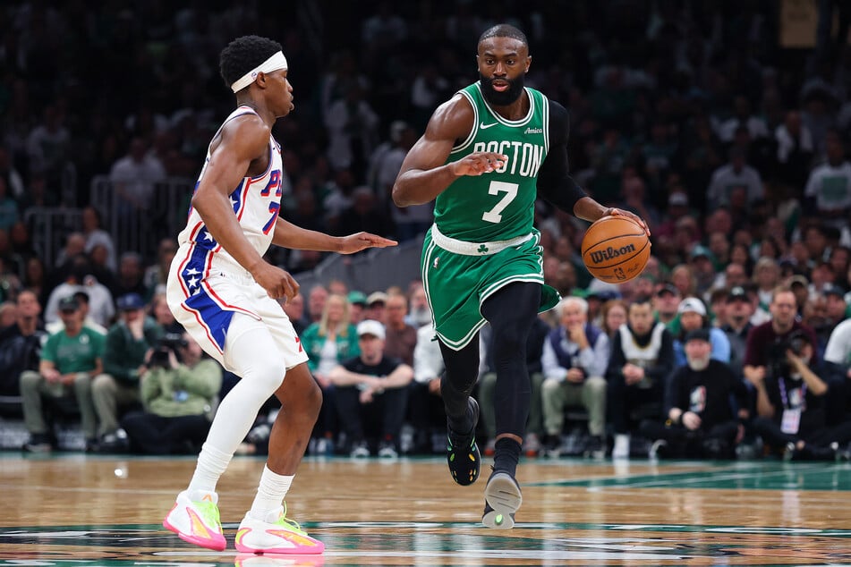 Jaylen Brown of the Boston Celtics is defended by Vj Edgecombe of the Philadelphia 76ers during game seven of the first round of the NBA Eastern Conference Playoffs at TD Garden on May 2, 2026.