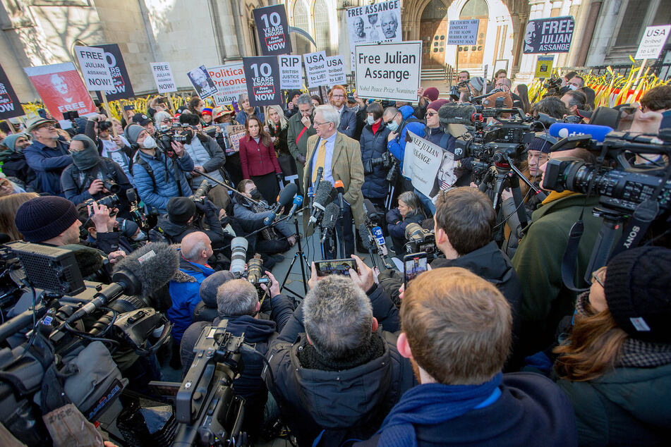 Protesters gathered in front of London's Royal Courts of Justice in support of Julian Assange on December 10, 2021.