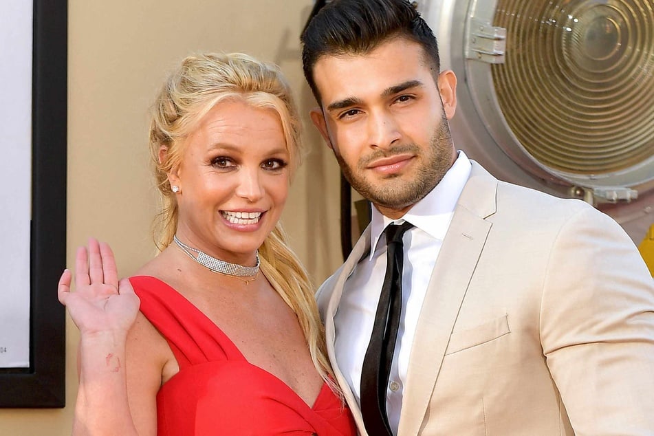 Britney Spears (l.) and Sam Asghari (r.) attend Sony Pictures' Once Upon A Time...In Hollywood Los Angeles Premiere on July 22, 2019 in Hollywood, California.