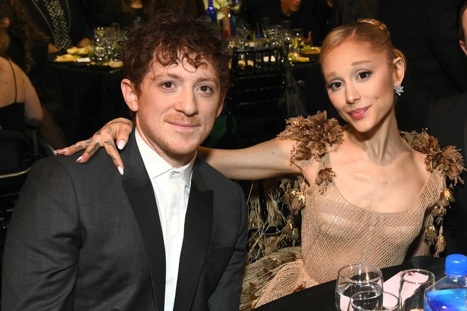 Ethan Slater (l.) and Ariana Grande (r.) attend FIJI Water at The 30th Critics Choice Awards at Barker Hangar on February 7, 2025 in Santa Monica, California.