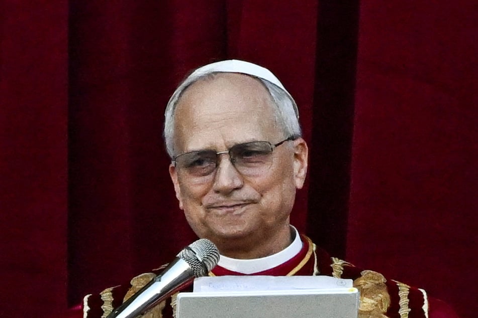 Newly elected Pope Leo XIV delivers the "Urbi et Orbi" message from the balcony of St. Peter's Basilica at the Vatican on May 8, 2025.