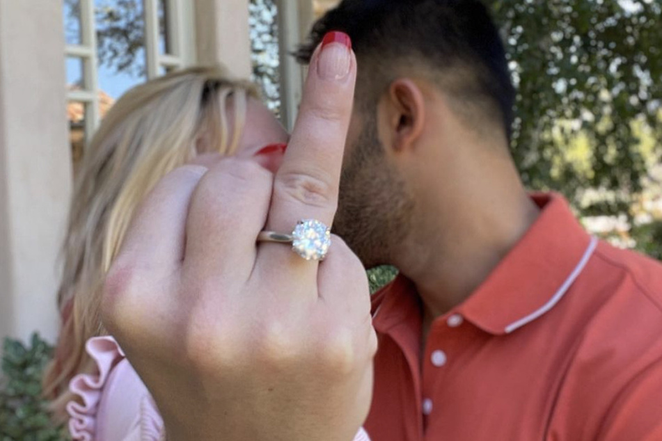 Sam Asghari (r) popped the question to Britney Spears (l) in September after five years together.