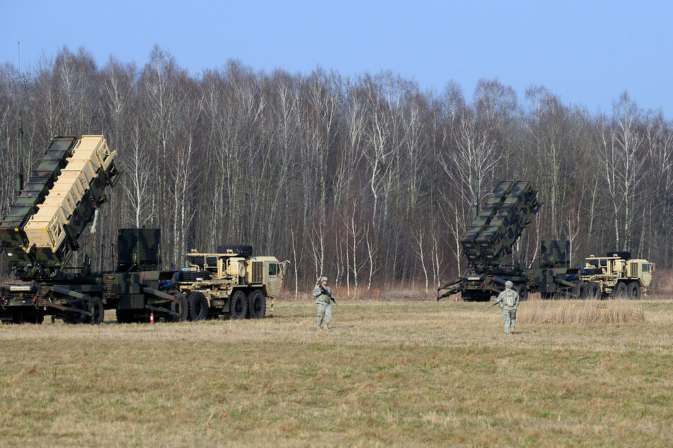 US troops next to a launching station of the Patriot air and missile defense system at a test range in Poland in 2015.