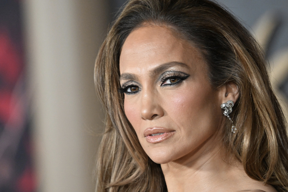 In her new documentary, Jennifer Lopez reveals she has been "manhandled and hit" in past relationships.