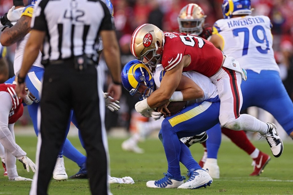 Defensive end Nick Bosa of the San Francisco 49ers sacks quarterback Matthew Stafford of the Los Angeles Rams during the first quarter at Levi's Stadium.