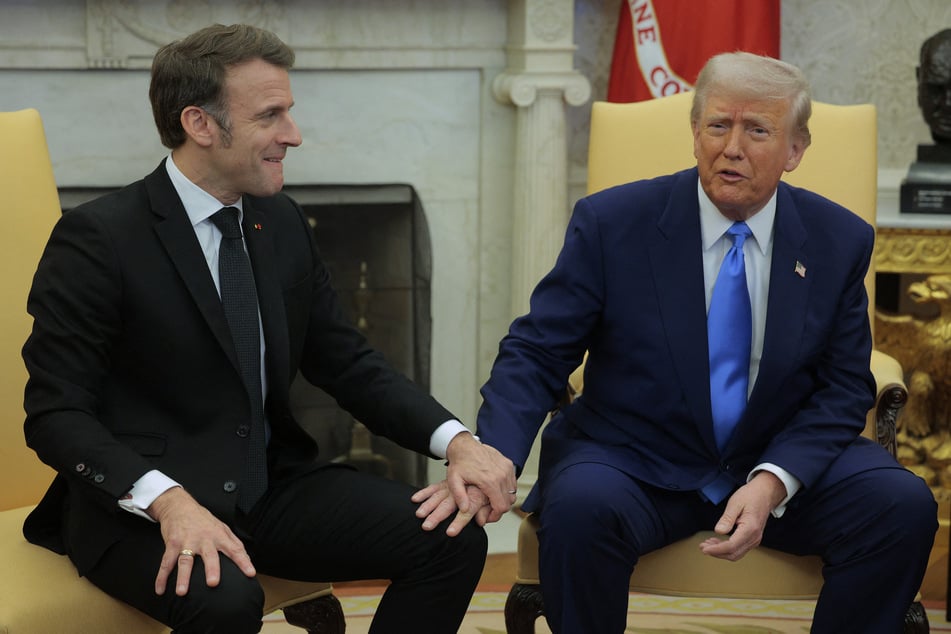 President Donald Trump hosts French President Emmanuel Macron as they answer questions from journalists in the Oval Office at the White House on Monday in Washington, DC.