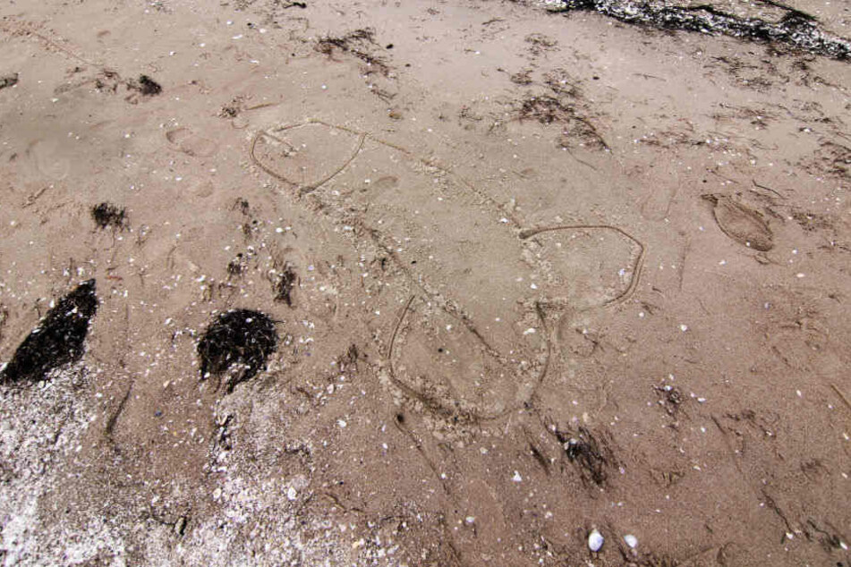 Zeichnungen wie diese am Strand sorgten bei den Nachbarn für Unverständnis. (Symbolbild)