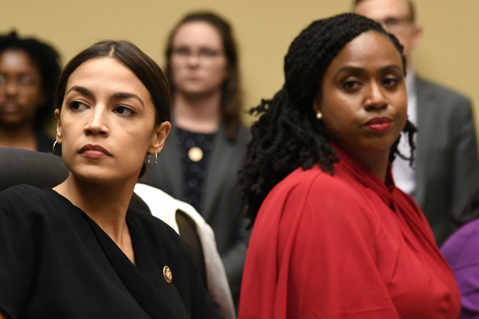 Massachusetts Rep. Ayanna Pressley (r.) will join a group of House Democrats in introducing a resolution concerning a violent video that targets New York Rep. Alexandria Ocasio-Cortez (l.).