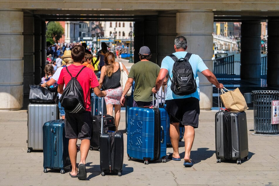 Venedig-Urlauber müssen sich vor dreisten Abzockern hüten, die vorgeben, beim Koffertragen helfen zu wollen. (Symbolfoto)