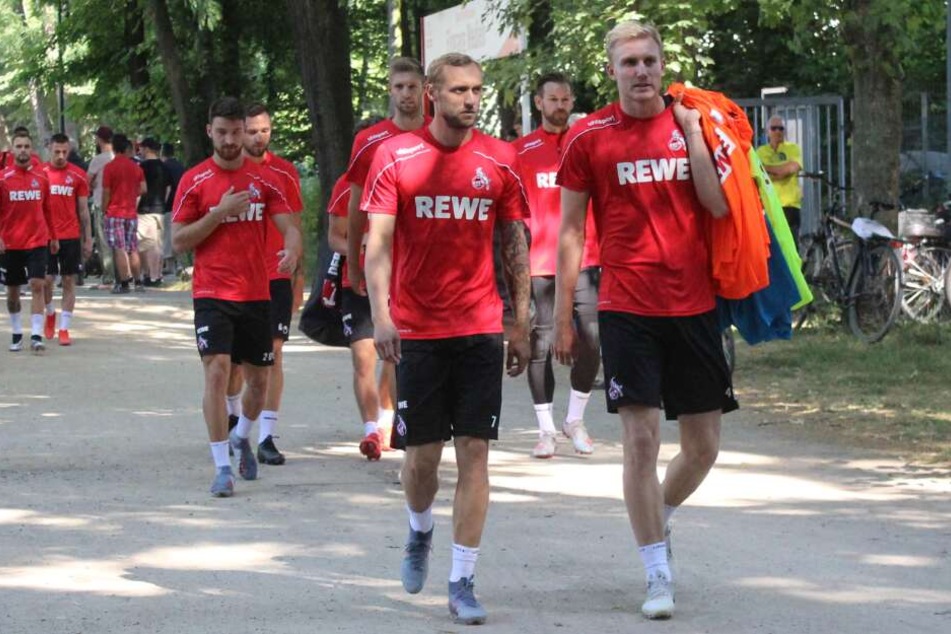 Die FC-Profis Marcel Risse (m) und Frederik Sörensen beim Trainingsauftakt am 4. Juli.