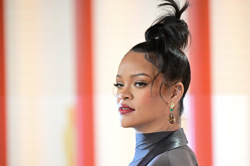 One of Rihanna's die-hard fans tried to make her the only girl in his world with a bizarre gesture.