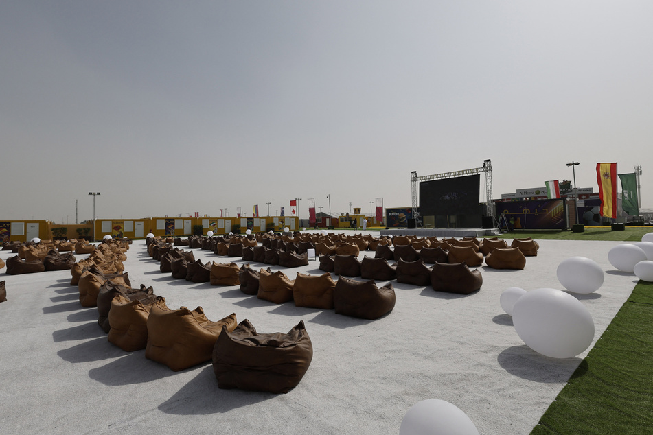 A fan zone in Doha, where beer will be sold only after 7 PM and will reportedly cost $14 a bottle.