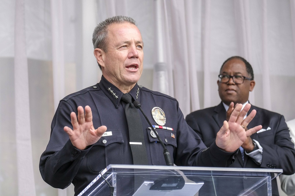 Michel Moore, shown here being sworn in as LAPD chief in 2018, promised a thorough investigation.