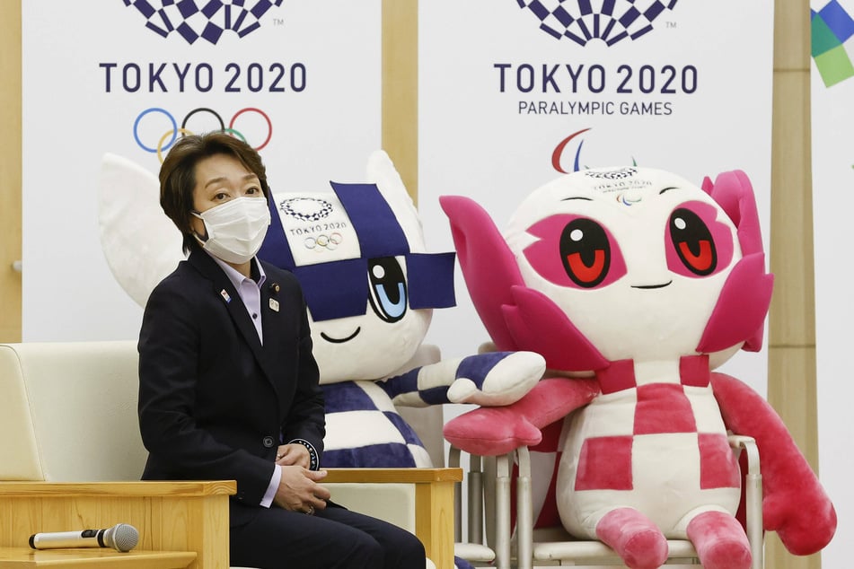 Tokyo 2020 President Seiko Hashimoto posed with the mascots for this year's Games.