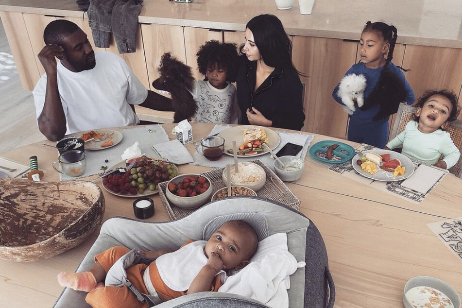 Kim Kardahsian and Kanye West with their four children, North, Saint, Chicago and Psalm.