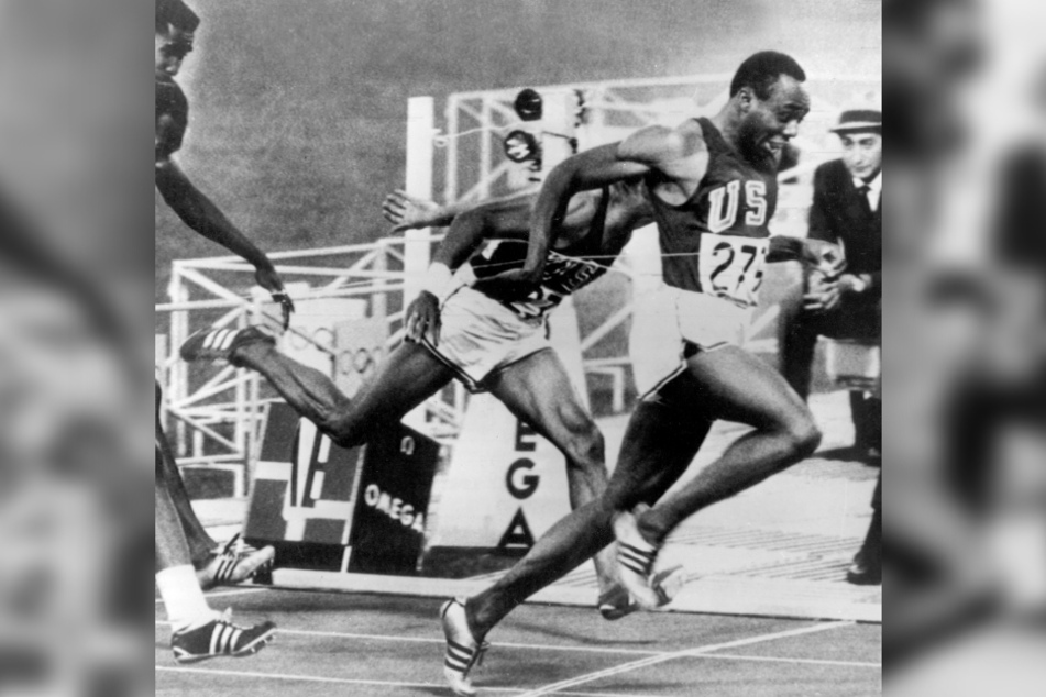 Jim Hines (†76, r.) hat als erster Sprinter die Zehn-Sekunden-Marke unterboten und sich so unsterblich gemacht.