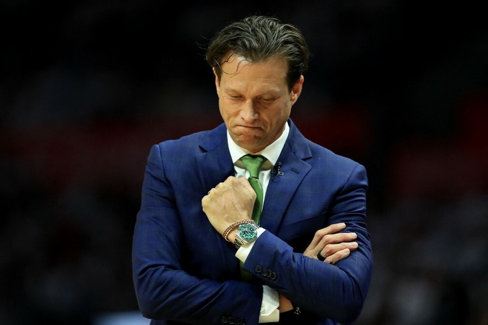 Head coach Quin Snyder fist pumps after a shot in the Western Conference Quarterfinals against the Los Angeles Clippers.