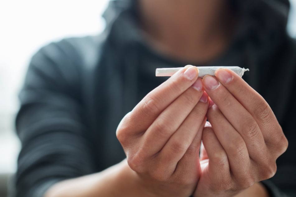 A person rolls a joint (stock image).