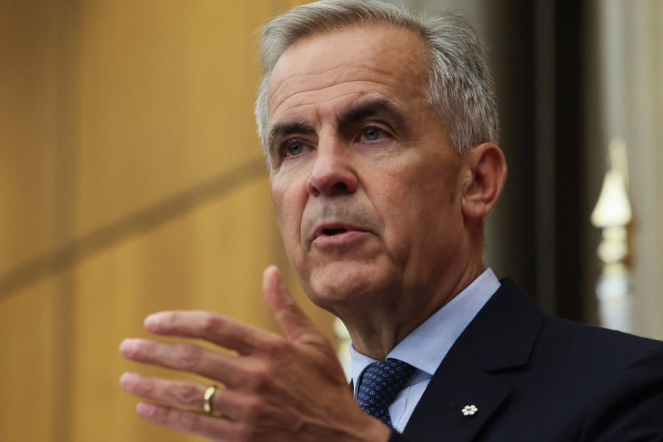 Canada's Prime Minister Mark Carney speaks at a press conference about recognizing Palestinian statehood, in Ottawa, Ontario, on July 30, 2025.