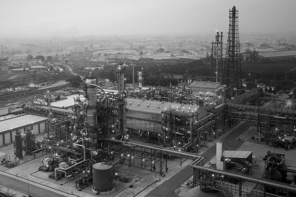 A fertilizer plant includes a complicated set of tubes, tanks, and pipes for making ammonia.