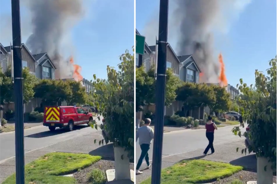 Aufnahmen zeigen Flammen und Rauchsäule, die nach dem Absturz einer Cessna aus dem Wohngebiet aufsteigen.