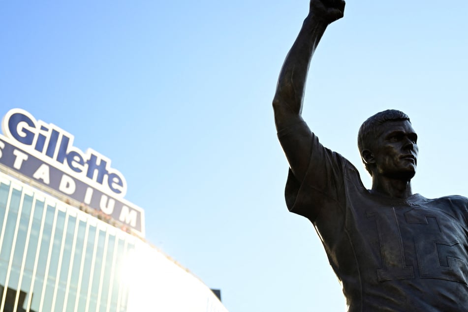 Former NFL quarterback Tom Brady has been immortalized with a 12-foot statue outside of the New England Patriots' Gillette Stadium.
