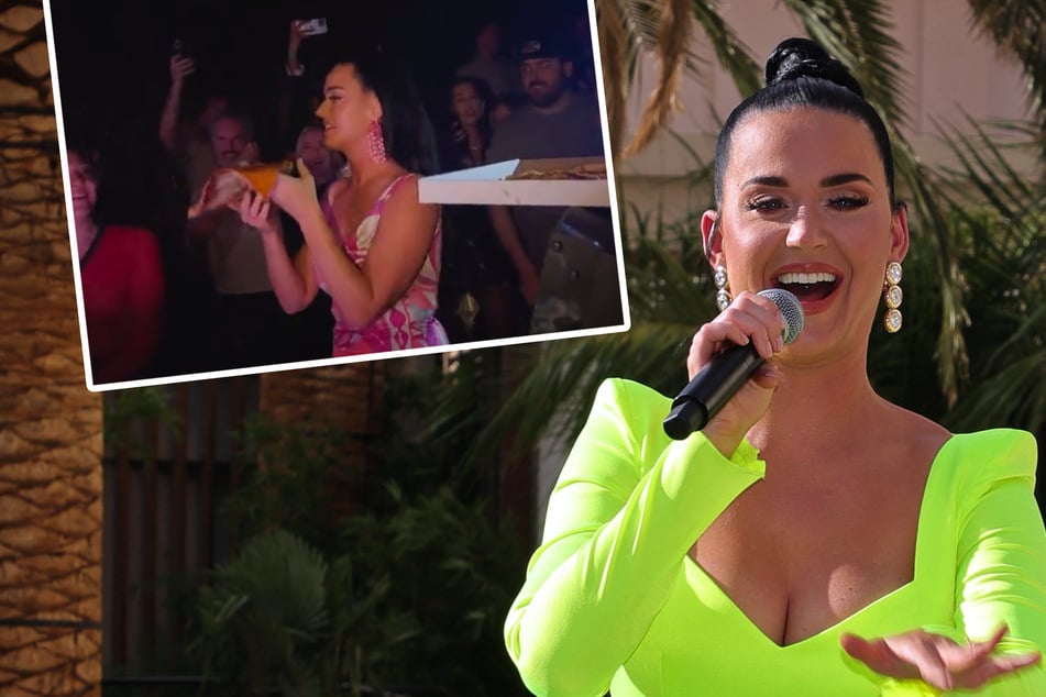 Katy Perry throws pizza around in a Vegas club and it's "the weirdest sh*t"