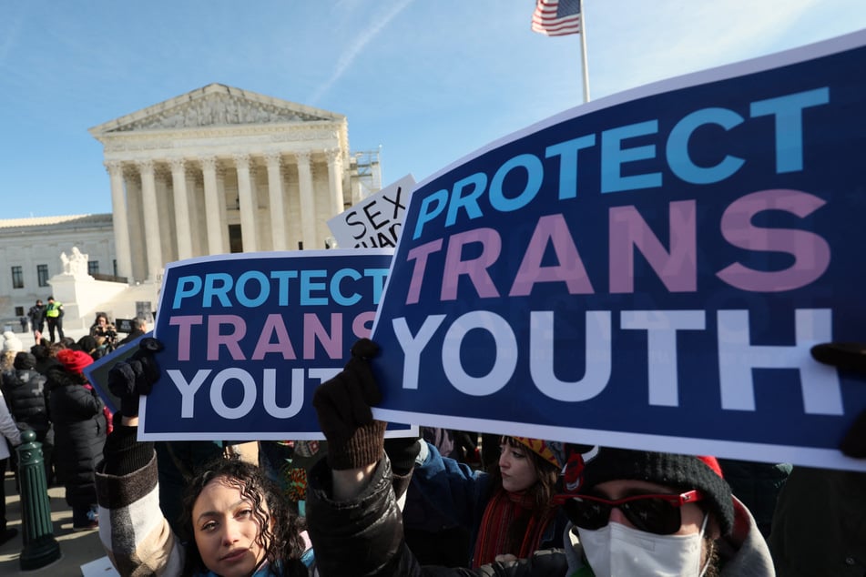 Congress approved its mammoth annual defense budget on Wednesday, raising troops' pay while blocking funding of some gender-affirming care for transgender children of service members.