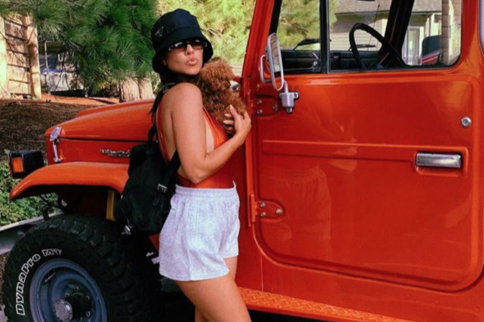Kourtney Kardashian proved that she's always been about the "poosh" life with a throwback summer photo dump.