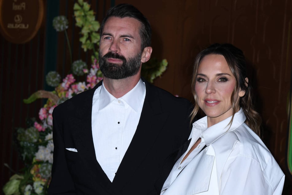 Melanie Chisholm – AKA Mel C – wed Australian actor-model Chris Dingwall (l) on July 18 in Cumbria.