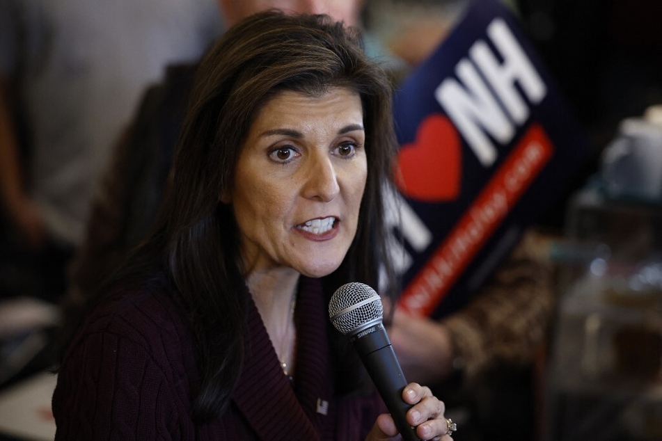 Nikki Haley talks to voters while campaigning at the Robie Country Store on January 18, 2024, in Hooksett, New Hampshire.