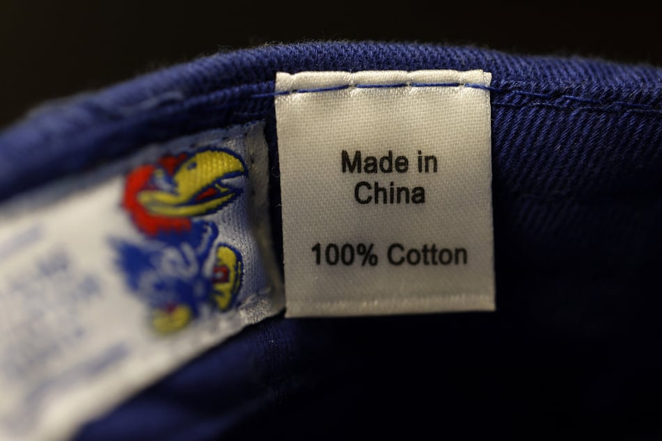 In this photo illustration, a "Made in China" label is seen on a baseball hat on April 8, 2025 in San Anselmo, California.