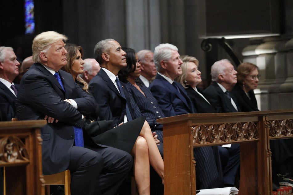 (L-R) Then-President Donald Trump, first lady Melania Trump, former President Barack Obama, former first lady Michelle Obama, former President Bill Clinton, former Secretary of State Hillary Clinton, and former President Jimmy Carter and former first lady Rosalynn Carter, listen as former President George W. Bush speaks during a State Funeral at the National Cathedral for former President George H.W. Bush, December 5, 2018 in Washington, DC.