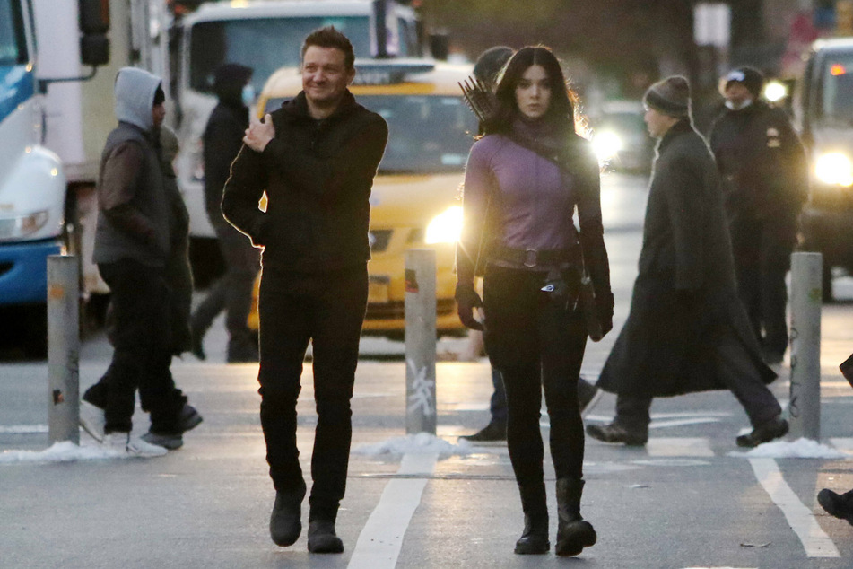 Jeremy Renner and Hailee Steinfeld on set on the Disney+ series Hawkeye.