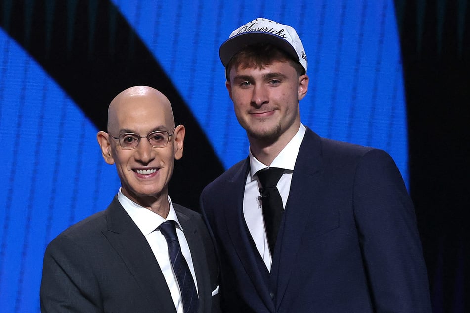 Cooper Flagg (r.) was selected first overall in the NBA draft on Wednesday by the Dallas Mavericks, where he'll join a star-laden team already touted as a playoff threat next season.