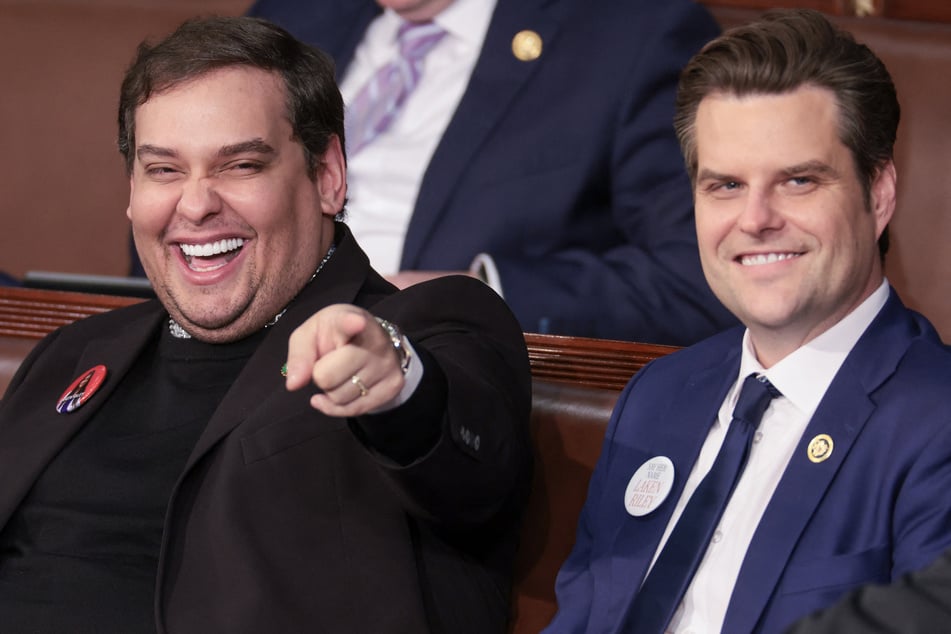 George Santos (l.) sitting with Matt Gaetz at the State of the Union address in the House chamber at the US Capitol in Washington DC on March 07, 2024.