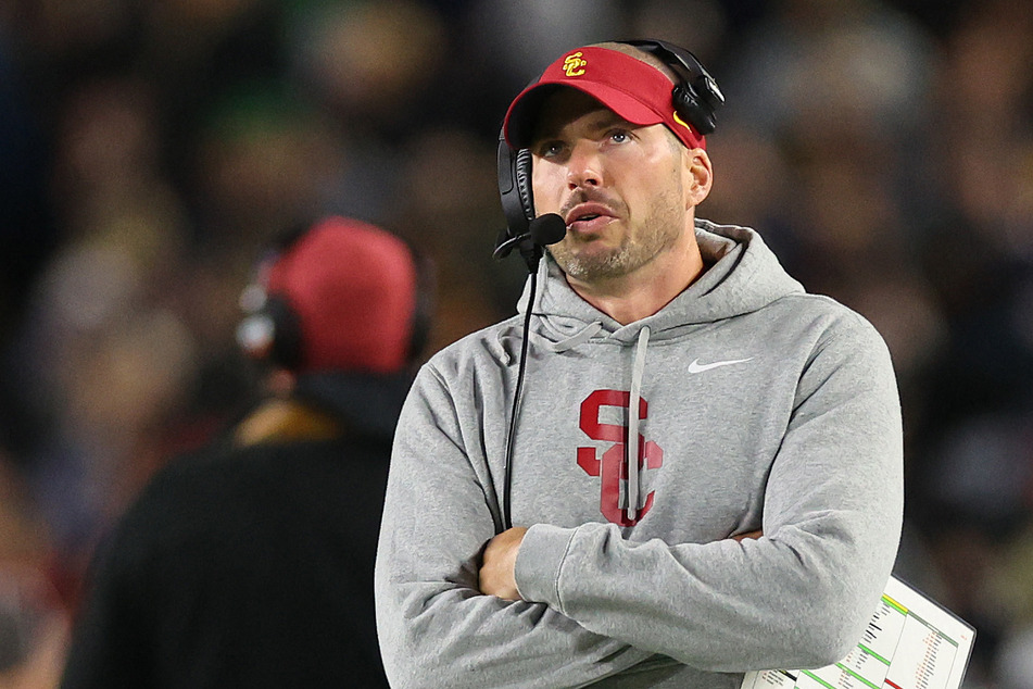 USC defensive coordinator Alex Grinch shown the doors after another Trojans disaster