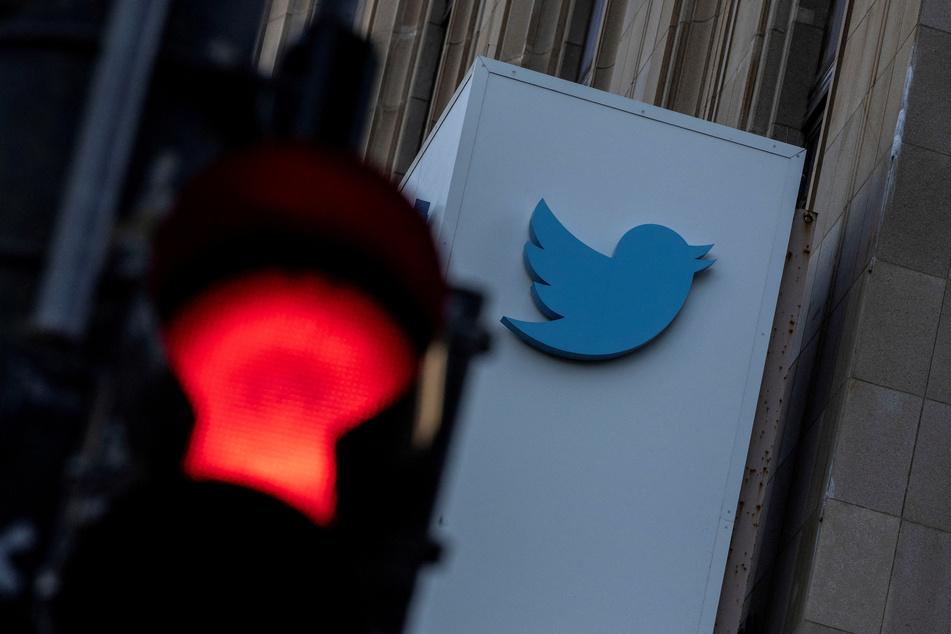 The Twitter logo is visible at the company's corporate headquarters in San Francisco, California.