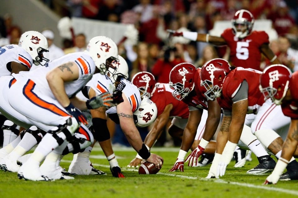 The Auburn Tigers lines up against the Alabama Crimson Tide during the the Iron Bowl at Bryant-Denny Stadium.
