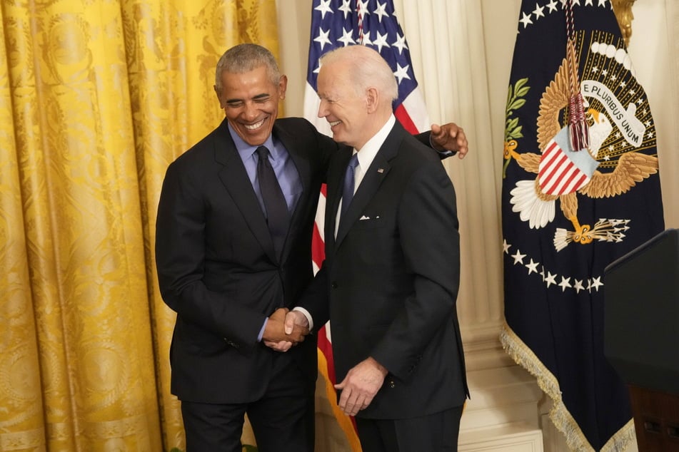President Joe Biden and former President Barack Obama embrace after making remarks on the Affordable Care Act and lowering health care costs for families.