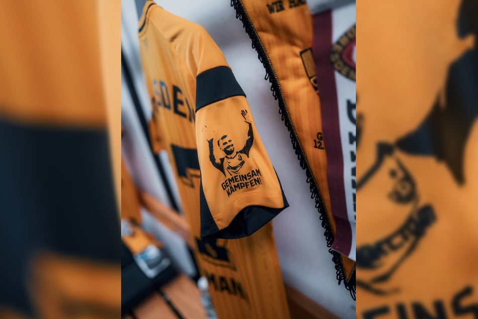 Was für eine starke Geste: Die Dynamo-Spieler trugen den schwer erkrankten Lars Bünning (28) auf dem rechten Ärmel. "Gemeinsam kämpfen!" stand darauf.