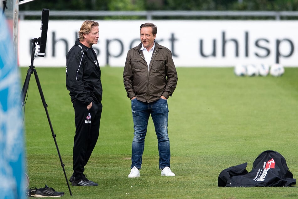 The summer transfer window was labor-intensive for Horst Heldt (51, right).