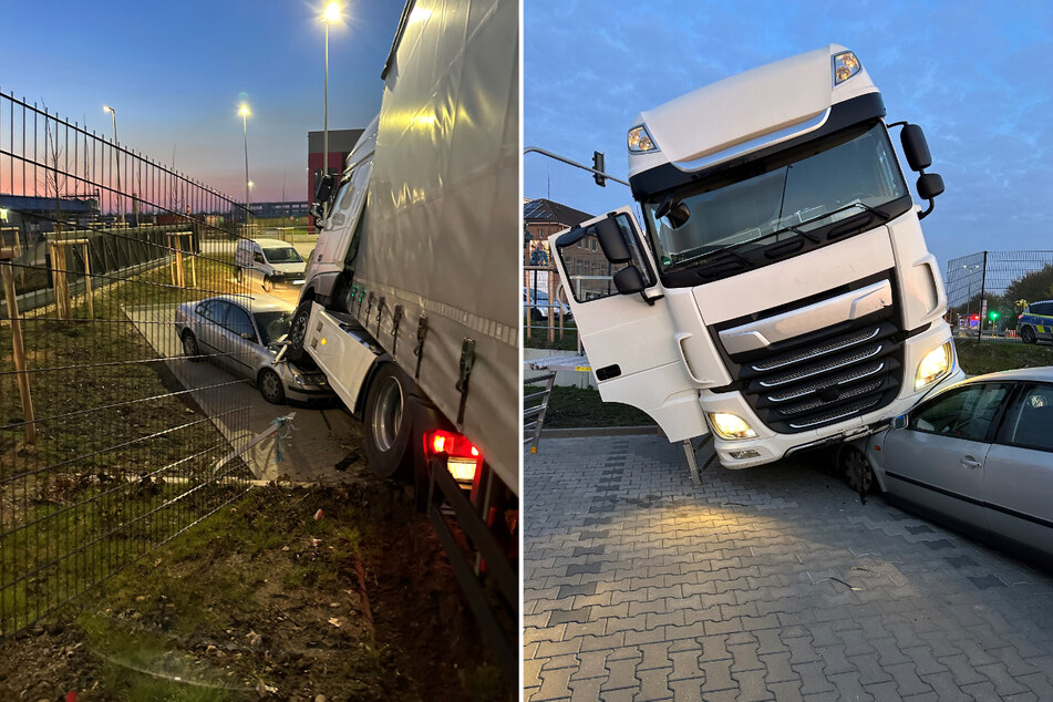 Das Führerhaus des Lkw hat die Motorhaube eines geparkten Autos unter sich begraben.